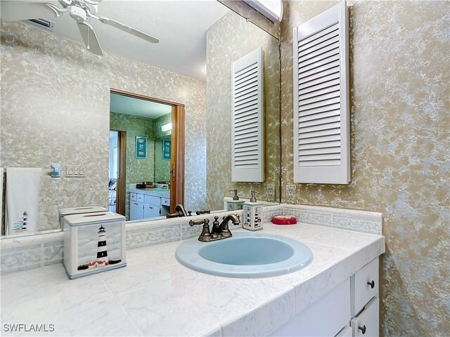 7397 Grande Pine Rd, Bokeelia, FL 33922 - bathroom featuring vanity and ceiling fan