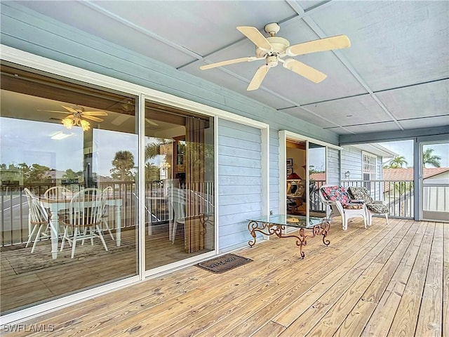 7397 Grande Pine Rd, Bokeelia, FL 33922 - unfurnished sunroom with ceiling fan
