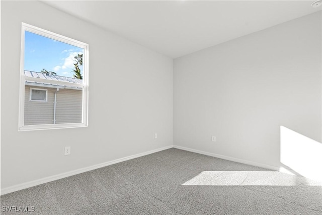 view of carpeted spare room