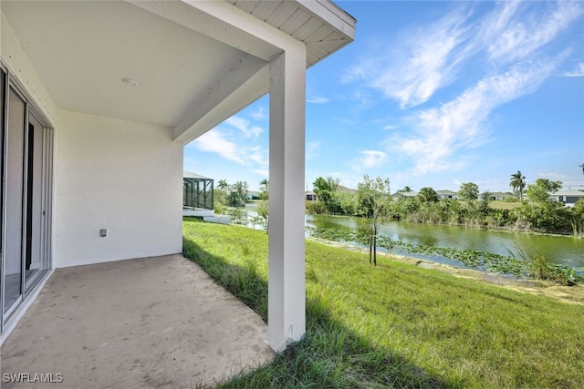 view of patio featuring a water view