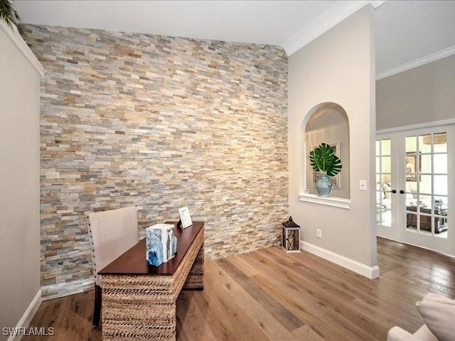 interior space featuring crown molding, french doors, dark hardwood / wood-style floors, and vaulted ceiling