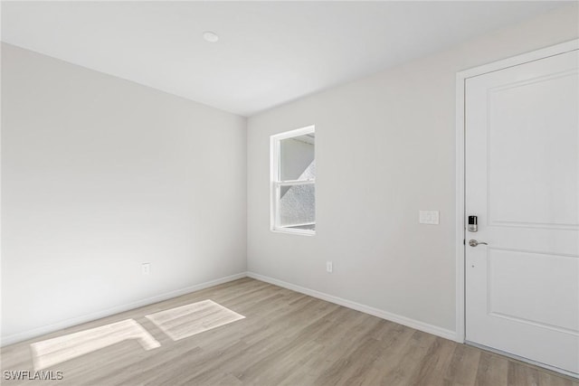 empty room featuring light hardwood / wood-style flooring