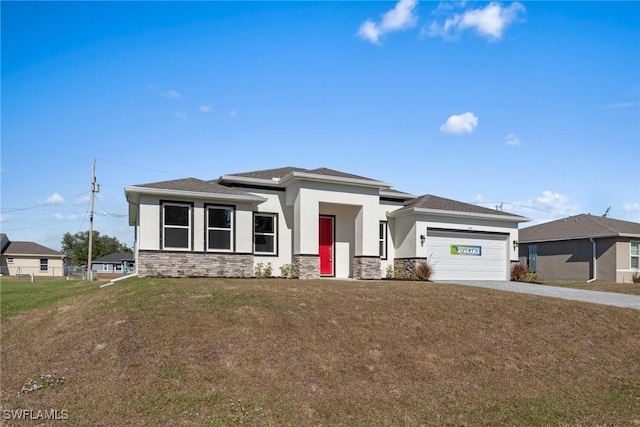 prairie-style house with a garage and a front yard