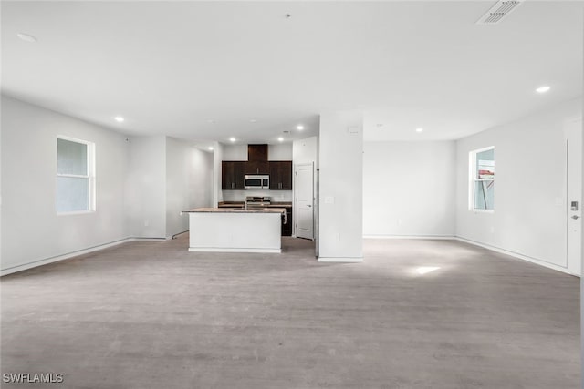 unfurnished living room with light hardwood / wood-style floors