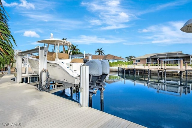 dock area featuring a water view