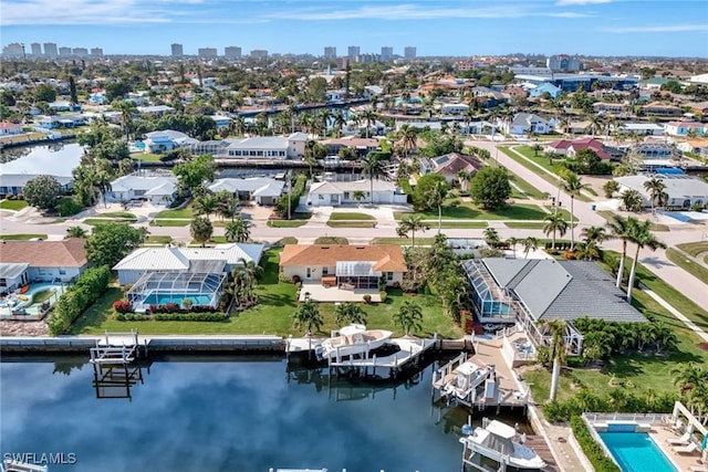 bird's eye view with a water view