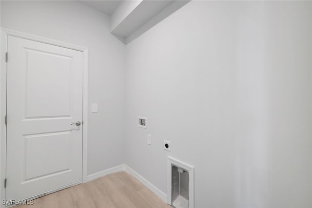 laundry room featuring washer hookup, light wood-type flooring, and hookup for an electric dryer