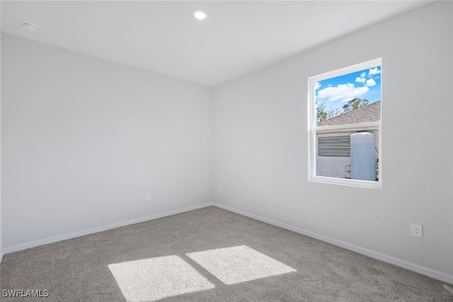 empty room featuring carpet floors