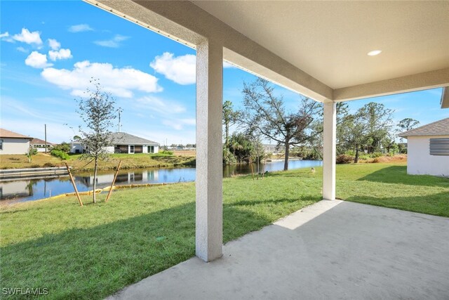 view of patio / terrace featuring a water view