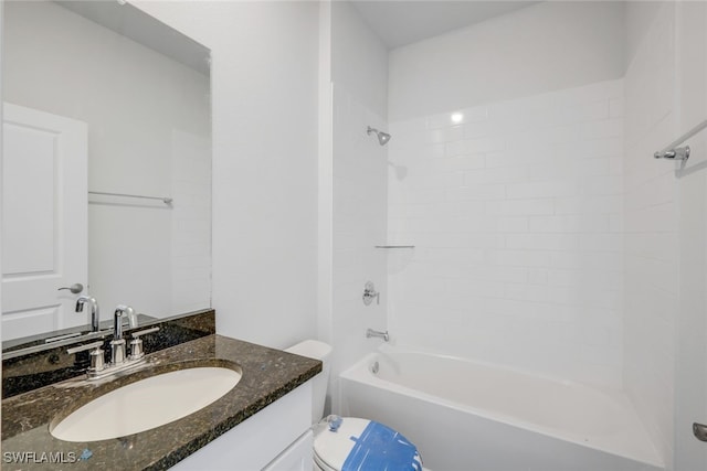 full bathroom with shower / washtub combination, vanity, and toilet