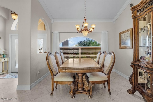 dining area with a chandelier and crown molding