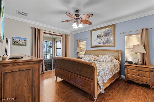 bedroom featuring access to exterior, dark hardwood / wood-style floors, ceiling fan, and ornamental molding