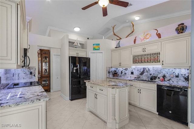 kitchen featuring backsplash, ceiling fan, black appliances, a kitchen island, and lofted ceiling