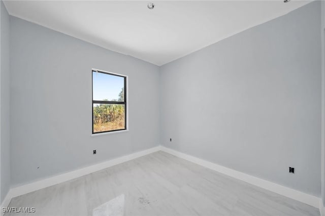 unfurnished room featuring light hardwood / wood-style flooring