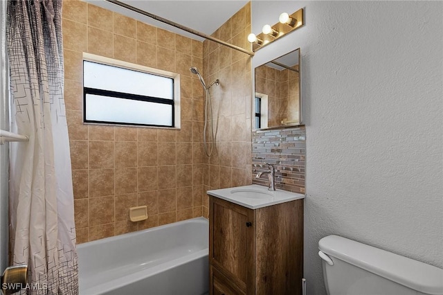 full bathroom featuring tasteful backsplash, vanity, shower / bath combination with curtain, and toilet