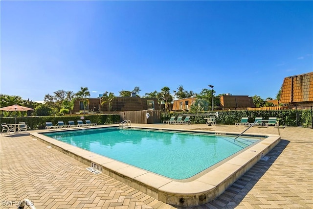 view of pool featuring a patio