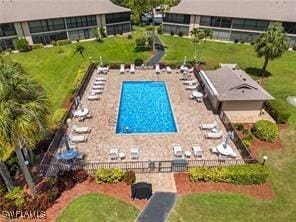 view of swimming pool with a patio