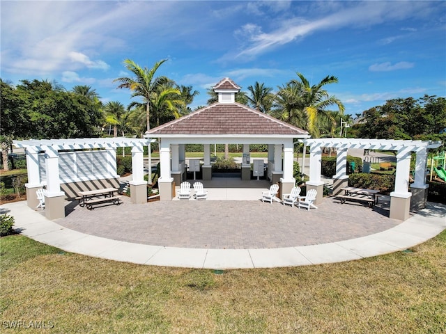 exterior space featuring a gazebo and a pergola