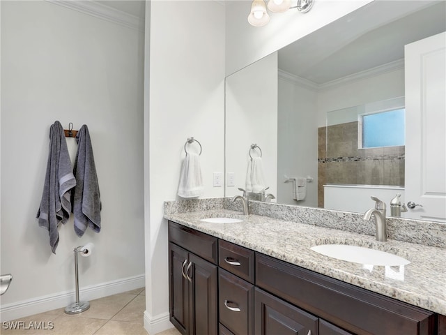 bathroom featuring tile patterned floors, vanity, and ornamental molding