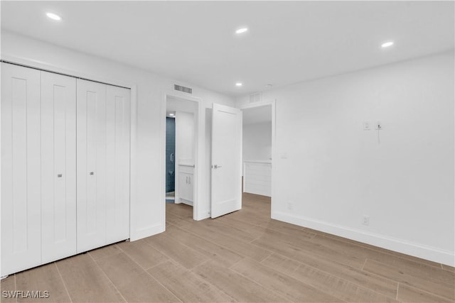 unfurnished bedroom with recessed lighting, baseboards, visible vents, and light wood finished floors