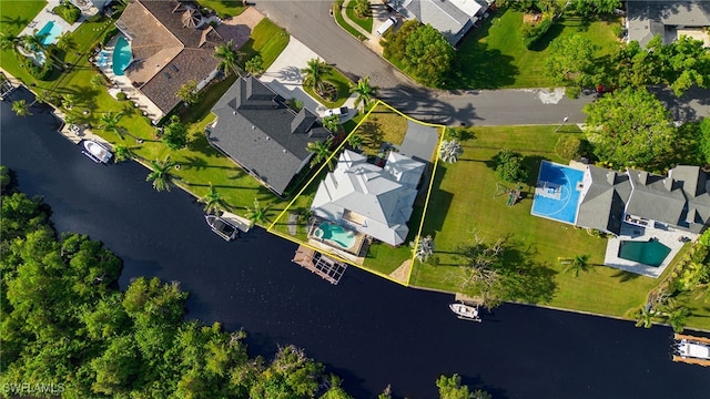 bird's eye view with a water view