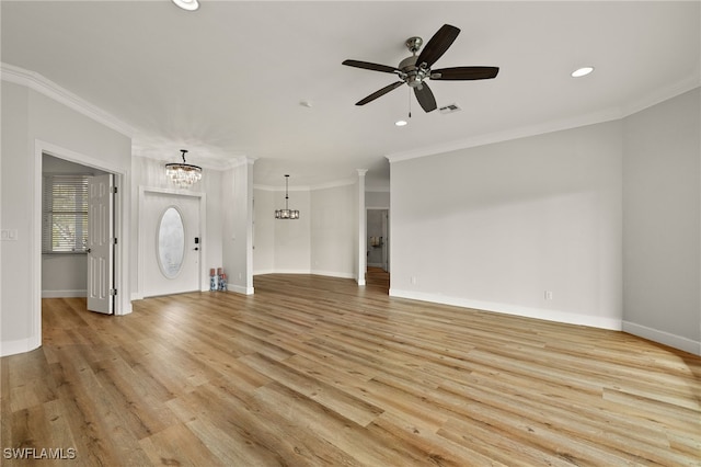 unfurnished living room with light hardwood / wood-style floors, ceiling fan with notable chandelier, and ornamental molding