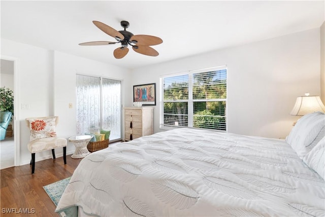 bedroom featuring hardwood / wood-style flooring and ceiling fan