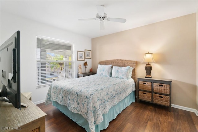 bedroom featuring ceiling fan and dark hardwood / wood-style floors