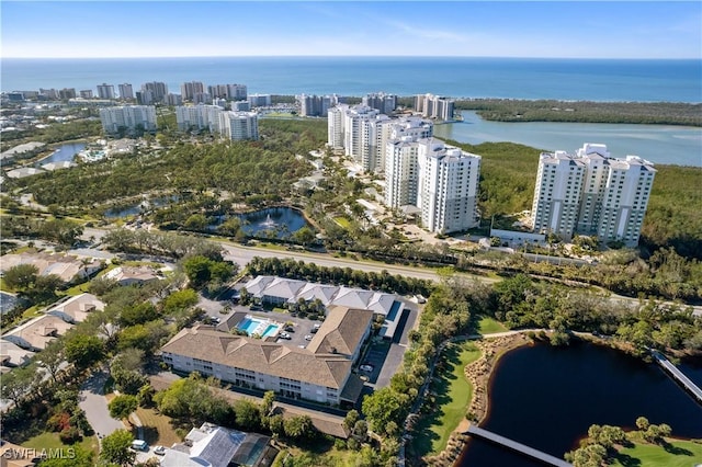 birds eye view of property featuring a water view