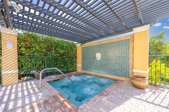 view of swimming pool featuring a community hot tub, a pergola, and a patio