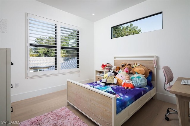 bedroom featuring light hardwood / wood-style floors