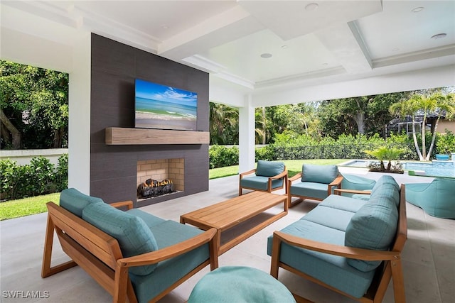 view of patio featuring an outdoor living space with a fireplace