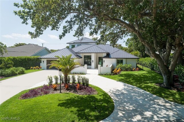 view of front of home with a front lawn