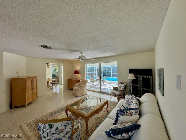 living room with ceiling fan