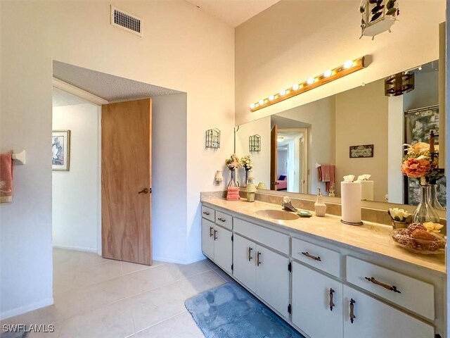 bathroom featuring vanity and tile patterned floors