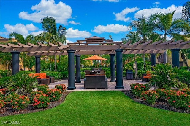 view of yard featuring a pergola, a patio area, and an outdoor living space