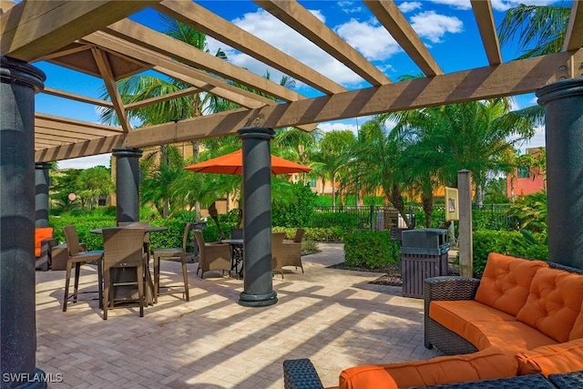 view of patio featuring a pergola and an outdoor hangout area