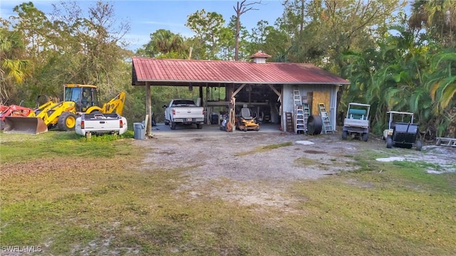 view of parking featuring a carport