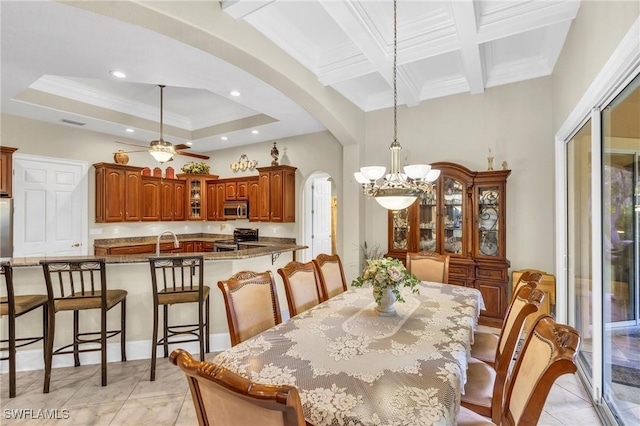 tiled dining room featuring beamed ceiling, ceiling fan with notable chandelier, crown molding, and coffered ceiling