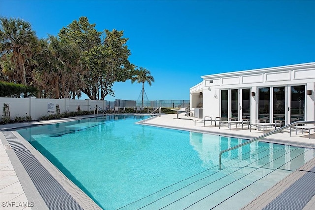 view of swimming pool featuring a patio