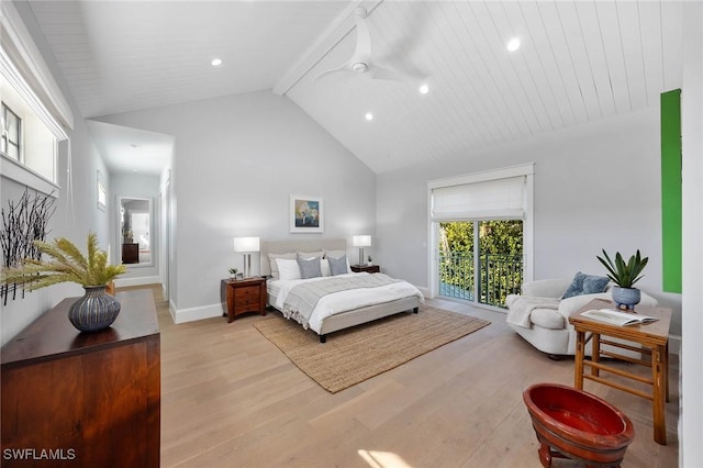 bedroom with high vaulted ceiling, beam ceiling, baseboards, and wood finished floors