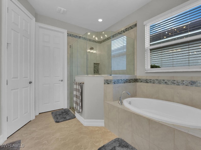 bathroom featuring plus walk in shower