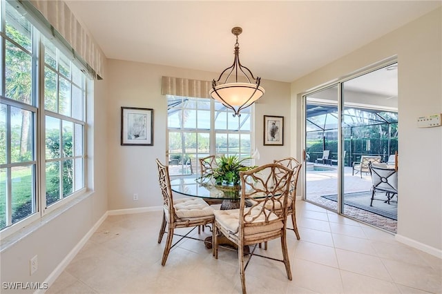 dining area featuring light tile patterned floors