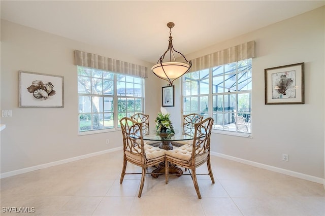 dining space with light tile patterned floors