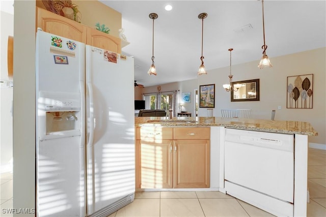 kitchen with ceiling fan with notable chandelier, light brown cabinetry, decorative light fixtures, light tile patterned floors, and white appliances