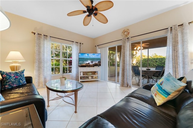 tiled living room featuring ceiling fan