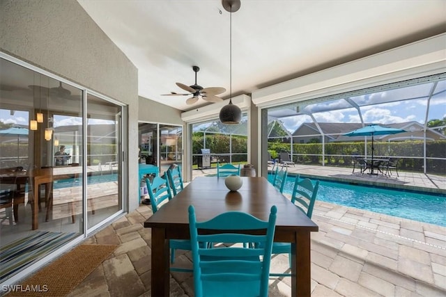 view of pool with ceiling fan