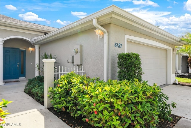 view of home's exterior featuring a garage