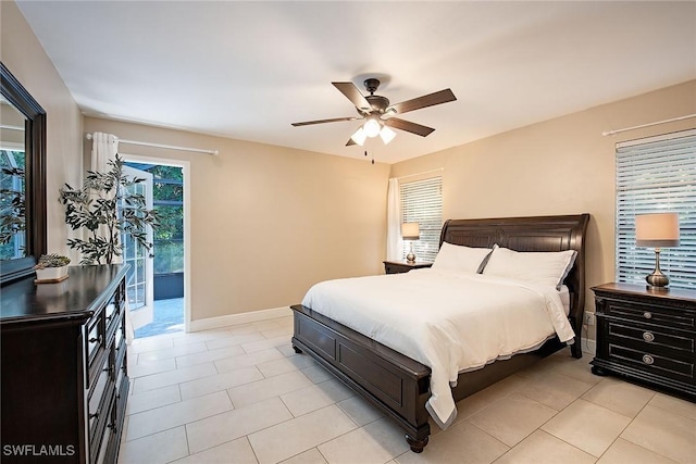 bedroom with ceiling fan and light tile patterned floors