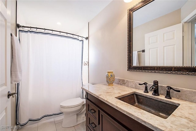 bathroom featuring tile patterned flooring, vanity, toilet, and a shower with curtain